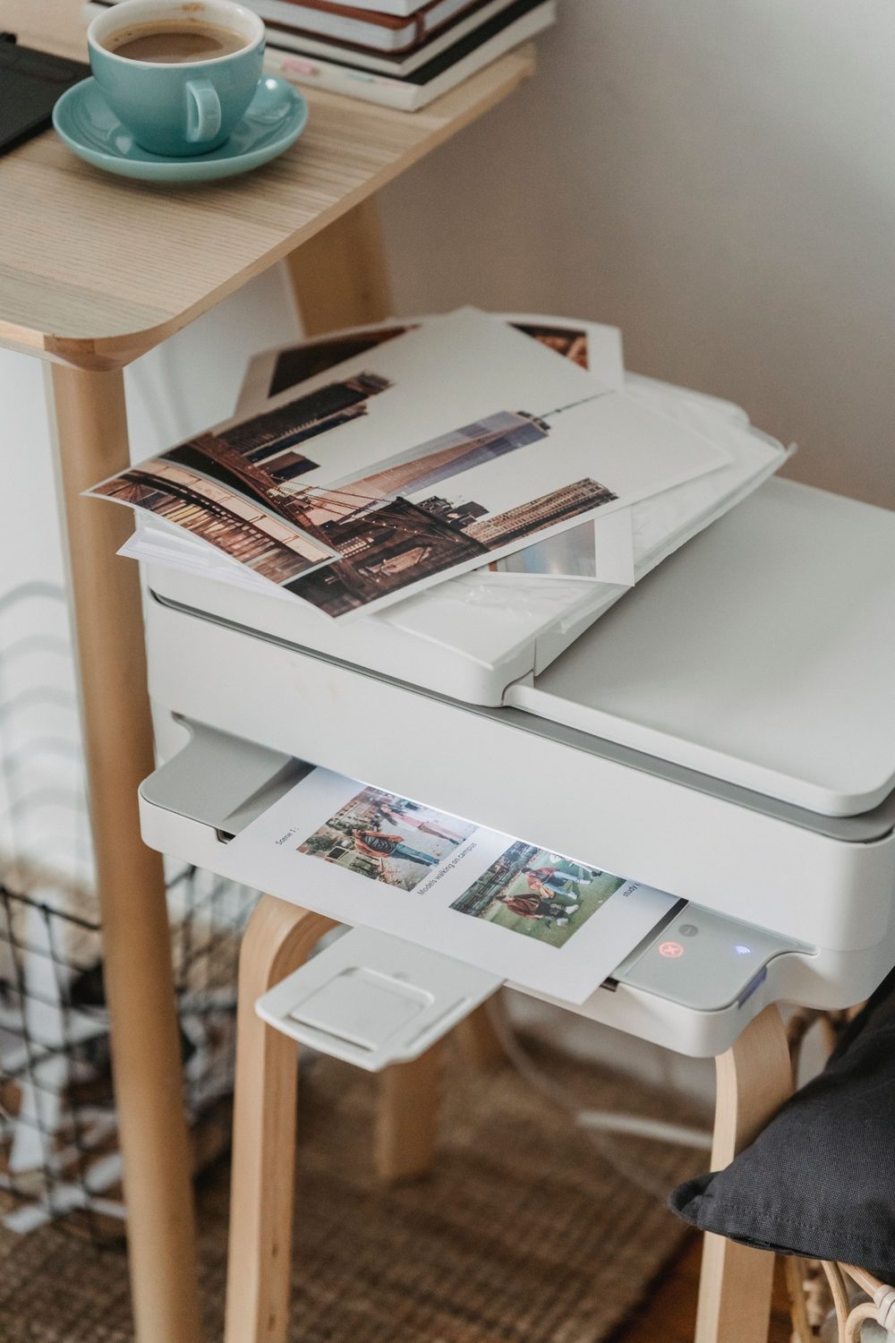 Photo prints coming out of a printer